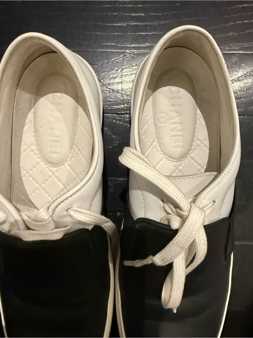 CHANEL Black and White Leather Slip-On Sneakers with laces